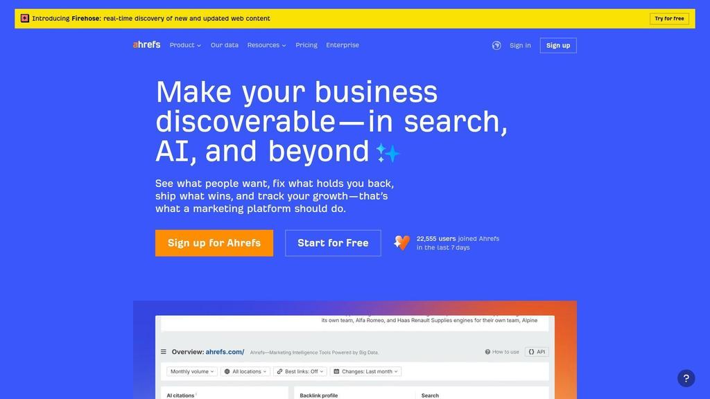 Ahrefs homepage promoting search and AI visibility, with sign-up buttons and a preview of its marketing analytics dashboard